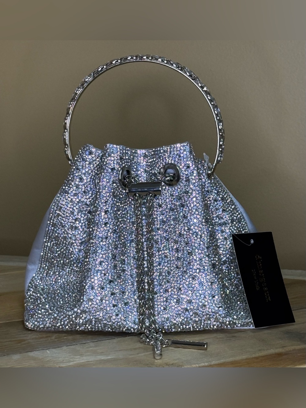 Crystal-Embellished Silver Bucket Bag with Metallic Handle & Crossbody Chain